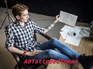 A0TattooedTomas